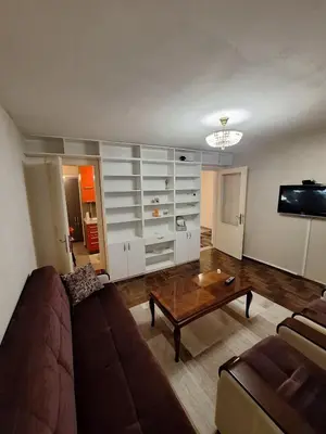a living room with a couch and a coffee table at Nova varos apartman in Banja Luka