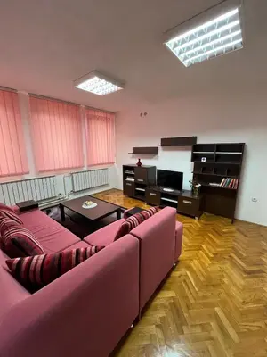 a living room with a couch and a table at StayBihac in Bihać