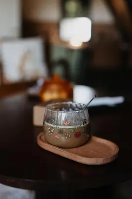 a small bowl with a spoon sitting on a table at Villa Natura in Bosanska Gradiška