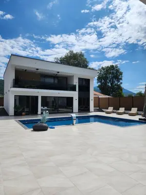 a house with a swimming pool in front of it at La Villa Luxury Home Bihac in Bihać