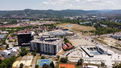 an aerial view of a city with a building at Dolce notte in Železnička Stanica Incel