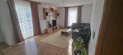 a living room with a couch and a tv at Apartman Ivan in Tomislavgrad