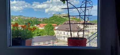 a window with a view of a city at Bella vista in Jajce