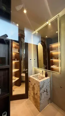 a bathroom with a marble sink and a mirror at Banja Luka Apartment Brigita in Banja Luka
