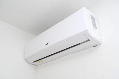 a white air conditioner hanging on a ceiling at Apartman Nina in Jajce