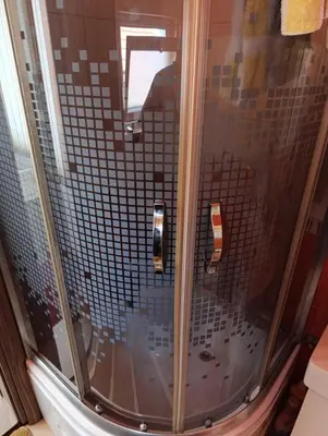 a shower with a glass door in a bathroom at Gajanka in Bugojno