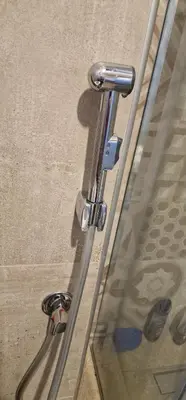 a glass door with a metal handle on a car at Apartment Plava Voda in Travnik