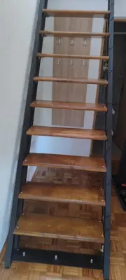a set of wooden stairs in a room at Vikendica Bregovi in Doboj