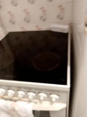 a close up of an oven with its door open at Secret garden in Visoko