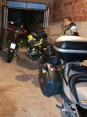 a group of motorcycles parked in a garage at Kuća na dan in Bosansko Grahovo