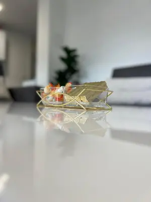 a plastic container with food in it on a table at Apartman Sara in Teslić