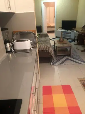 a kitchen counter with a toaster on top of it at Apartment Medi in Visoko