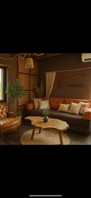 a living room with a couch and a coffee table at Petrovf Place