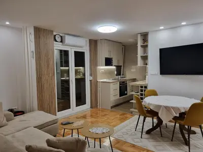 a living room with a couch and a table at Palada apartment in Banja Luka