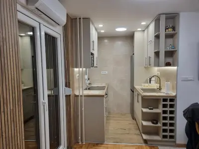 a small bathroom with a sink and a mirror at Palada apartment in Banja Luka