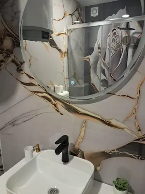 a bathroom with a sink and a mirror at Galija in Tomislavgrad