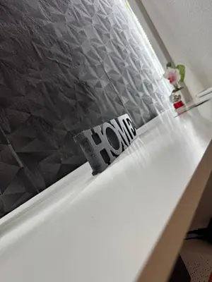 a sign that says no sitting on a bed at Luxury Apartman Dzafic in Sanski most