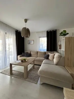 a living room with a couch and a coffee table at Villa Laura in Gornji Vakuf