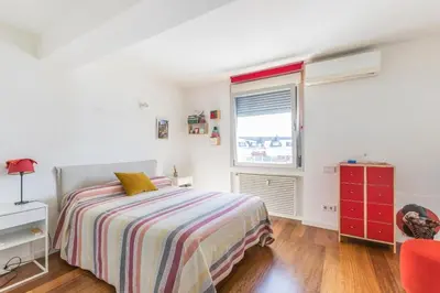 a white bedroom with a bed and a window at Kuća za odmor u Bosanskoj Krupi in Bosanska Krupa