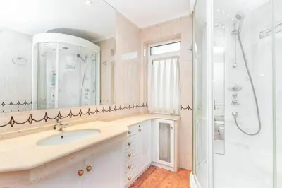 a bathroom with a sink and a shower at Moderan smještaj s parkingom Nova Bila in Nova Bila