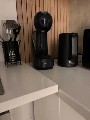 a coffee maker sitting on top of a counter at Apartman Rejjan in Zenica