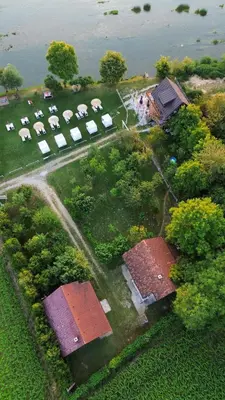 an aerial view of a farm with a herd of animals at Sofkin salas in Prijedor