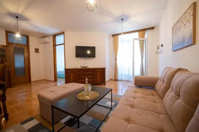 a living room with a couch and a coffee table at Apartman Magija in Banja Luka