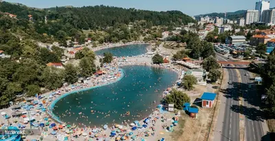 an aerial view of a beach with people in the water at Tuzla Stay Apartment in Tuzla
