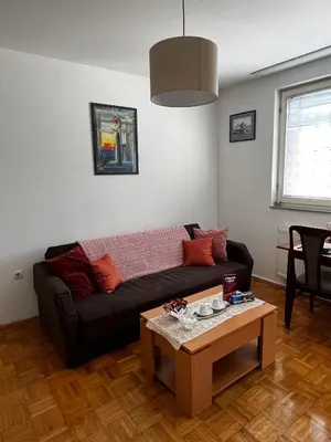 a living room with a couch and a table at Nataša in Doboj