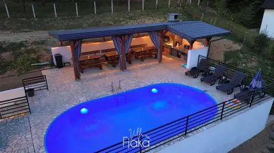 an overhead view of a swimming pool with a gazebo at Villa Fjaka in Banja Luka