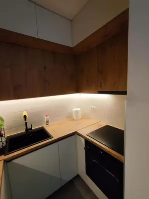 a kitchen with a sink and a stove at AnyBL03 in Železnička Stanica Incel