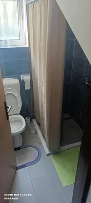 a bathroom with a toilet and a shower at Holiday home SaFari in Bosanska Krupa