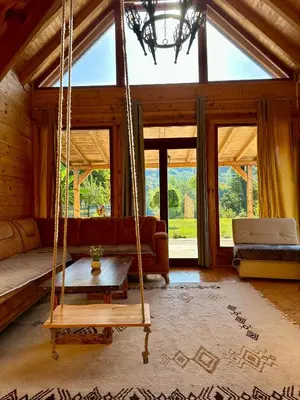 a room with a swing in a house at Dabar kuca za odmor in Banja Luka