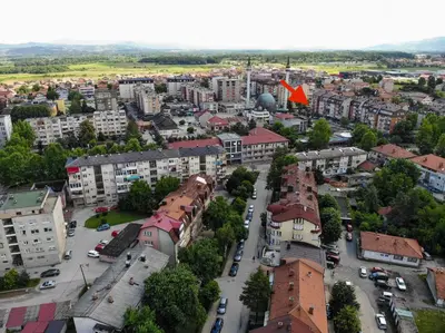 an aerial view of a city with buildings and cars at Apartman Lavanda in Živinice