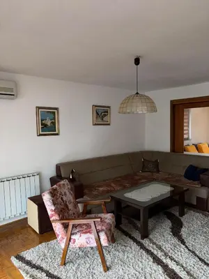 a living room with a couch and a table at Apartman Kahvica in Travnik