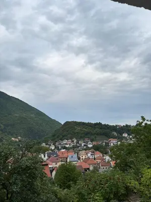 a view of a town with hills in the background at Apartman Kahvica in Travnik