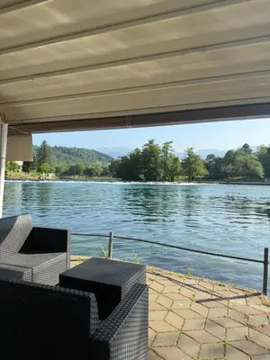 a view of a body of water from under a bridge at Royal Luxury Apartment in Bihać
