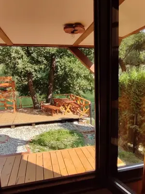 a view of a deck from a window at Plivski raj in Jezero