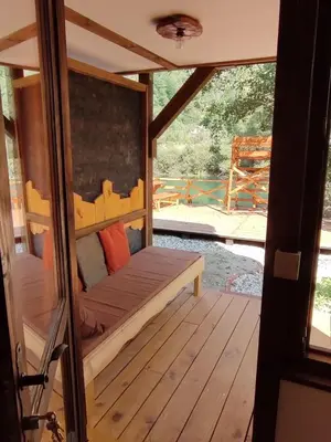 a porch with a bunk bed in a house at Plivski raj in Jezero