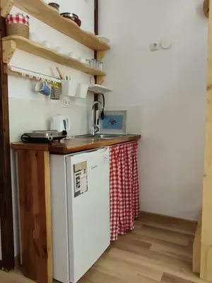 a kitchen with a sink and a dishwasher at Plivski raj in Jezero