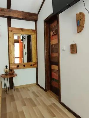 a room with a door and a table at Plivski raj in Jezero
