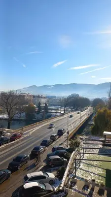 a highway with cars parked in a parking lot at Venecija Most in Banja Luka