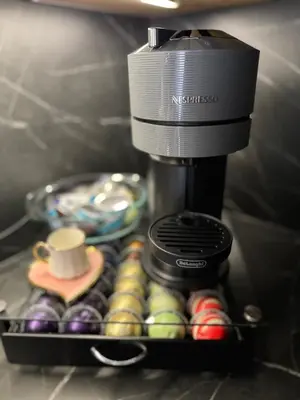 a coffee maker with a cup on top of it at Una-Luxury-suite in Bihać