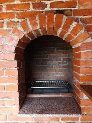 a brick archway in a brick wall at Ranč Kuzmanović in Doboj