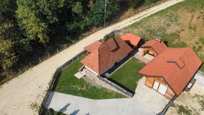 an overhead view of a house with a red roof at Ranč Kuzmanović in Doboj