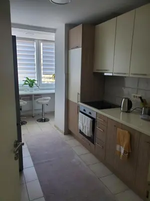 a kitchen with a sink and a stove top oven at StaraCarsija- Zenica, City Center in Zenica