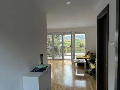 a living room with a couch and a table at Apartments Daisy in Banja Luka