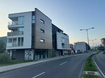 a building on the side of a road at CENTRAL POINT APARTMENT - City centar Zenica- in Zenica