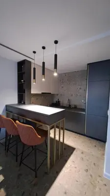 a kitchen with a table and chairs in a room at Relax Apartman DMBL in Banja Luka