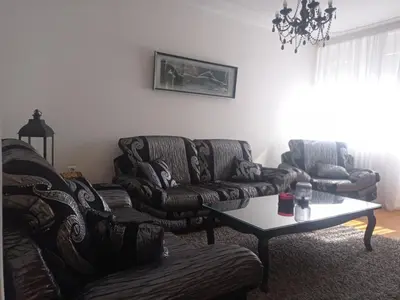 a living room with two couches and a coffee table at Apartman Centar in Banja Luka